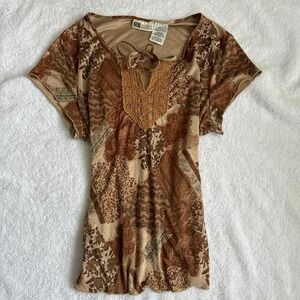 brown and tan boho top with lace details and tie bow